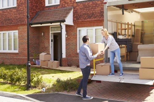 Safe moving practices with PPE and professional crew