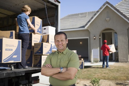 Professional removals team planning a London house move