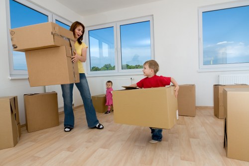 Local removals team handling boxes and furniture