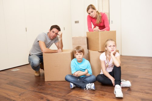 Packed boxes and furniture ready for a London van move