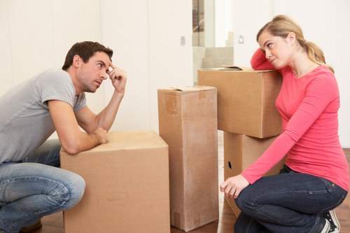 Packed moving boxes ready for transport in a London property