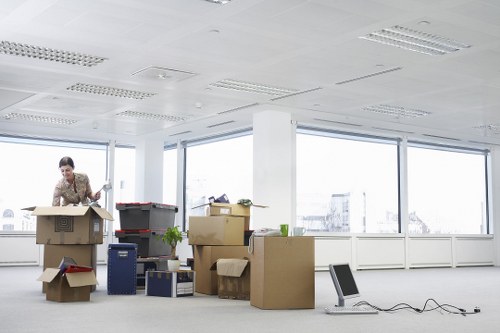 Packed moving boxes ready for transport in a London flat